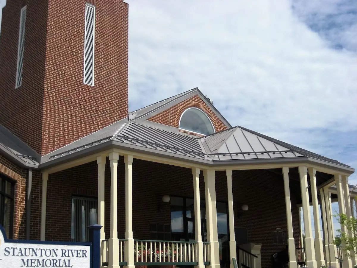 Skilled roofing craftsmen working on a residential roof in Westmore